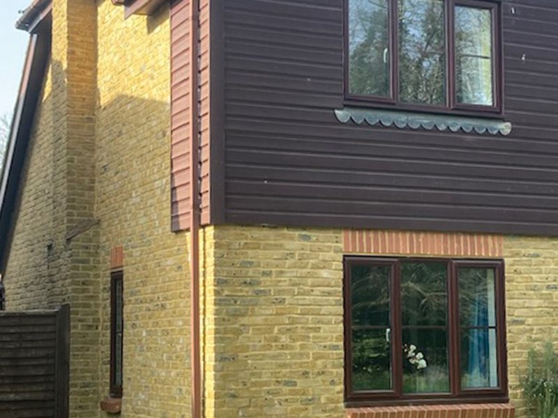 Before installation showing old mahogany windows