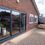 New aluminium bi-fold doors in anthracite grey external
